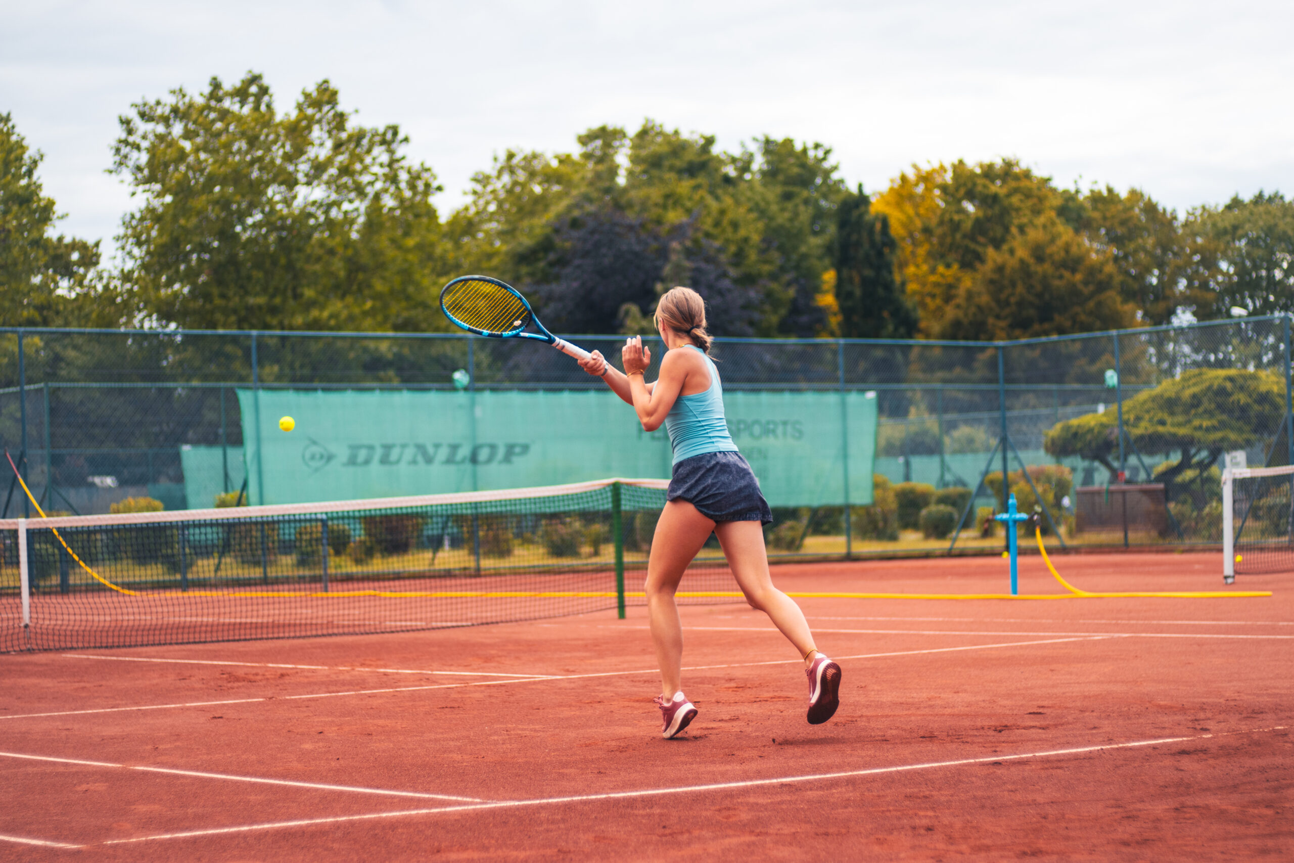 Female college tennis player